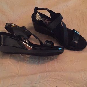 Black patent leather sandals 2” heel . Never worn